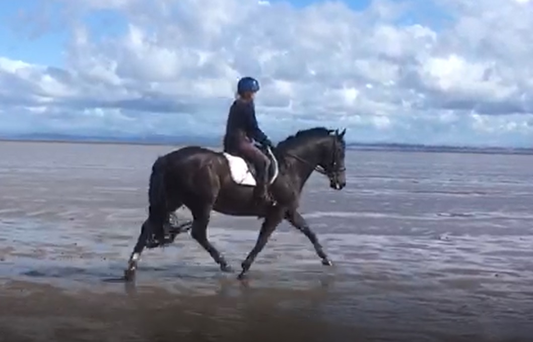 Riding on the beach